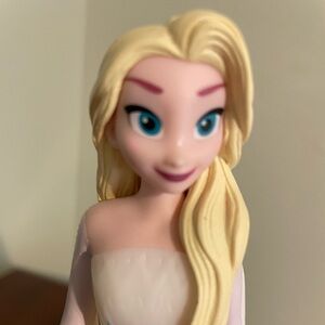 Frozen Elsa sings “Into the Unknown” colorful light and sound room glow